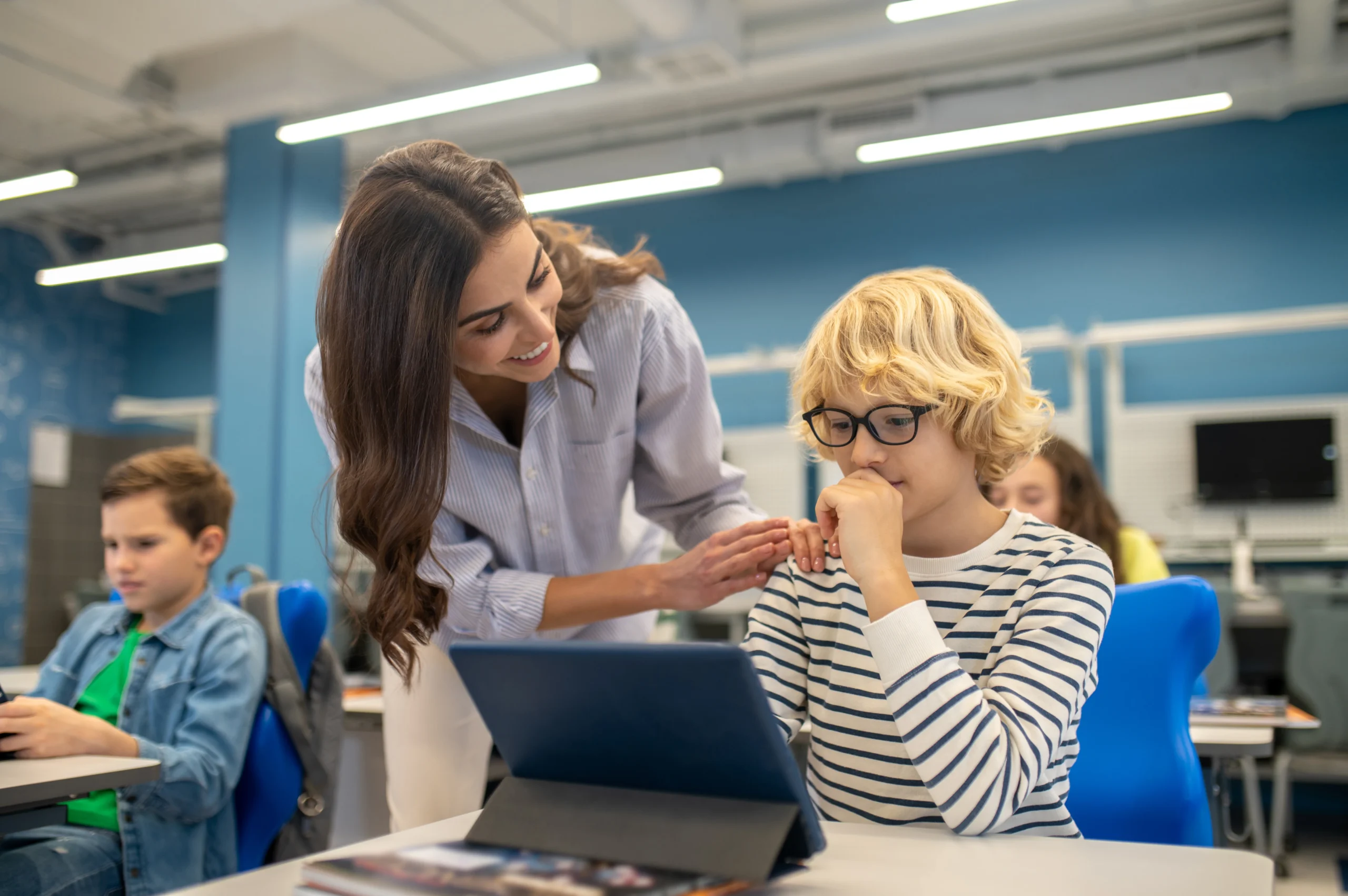 Teacher analyzing AI-generated feedback to improve GCSE exam preparation strategies